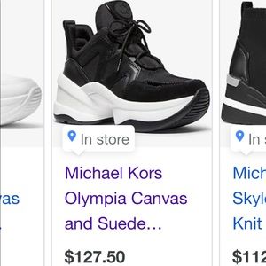 MICHAEL KORS
Olympia Canvas and Suede Trainer